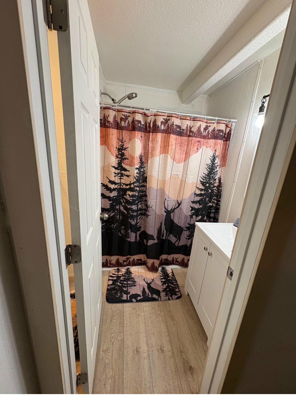 Half Dome Haven bathroom with rustic nature decor