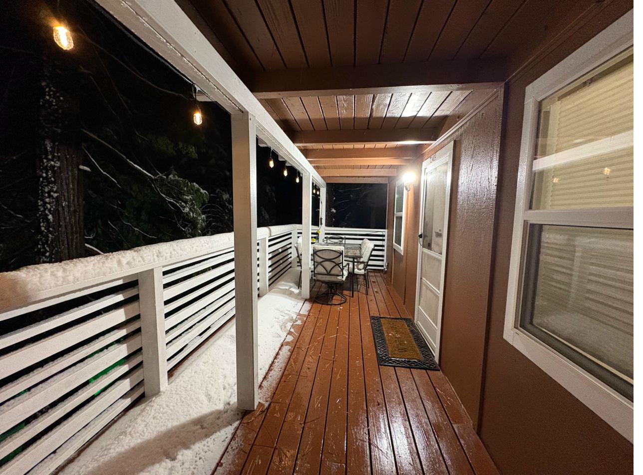 Half Dome Haven deck at night with Edison string lights