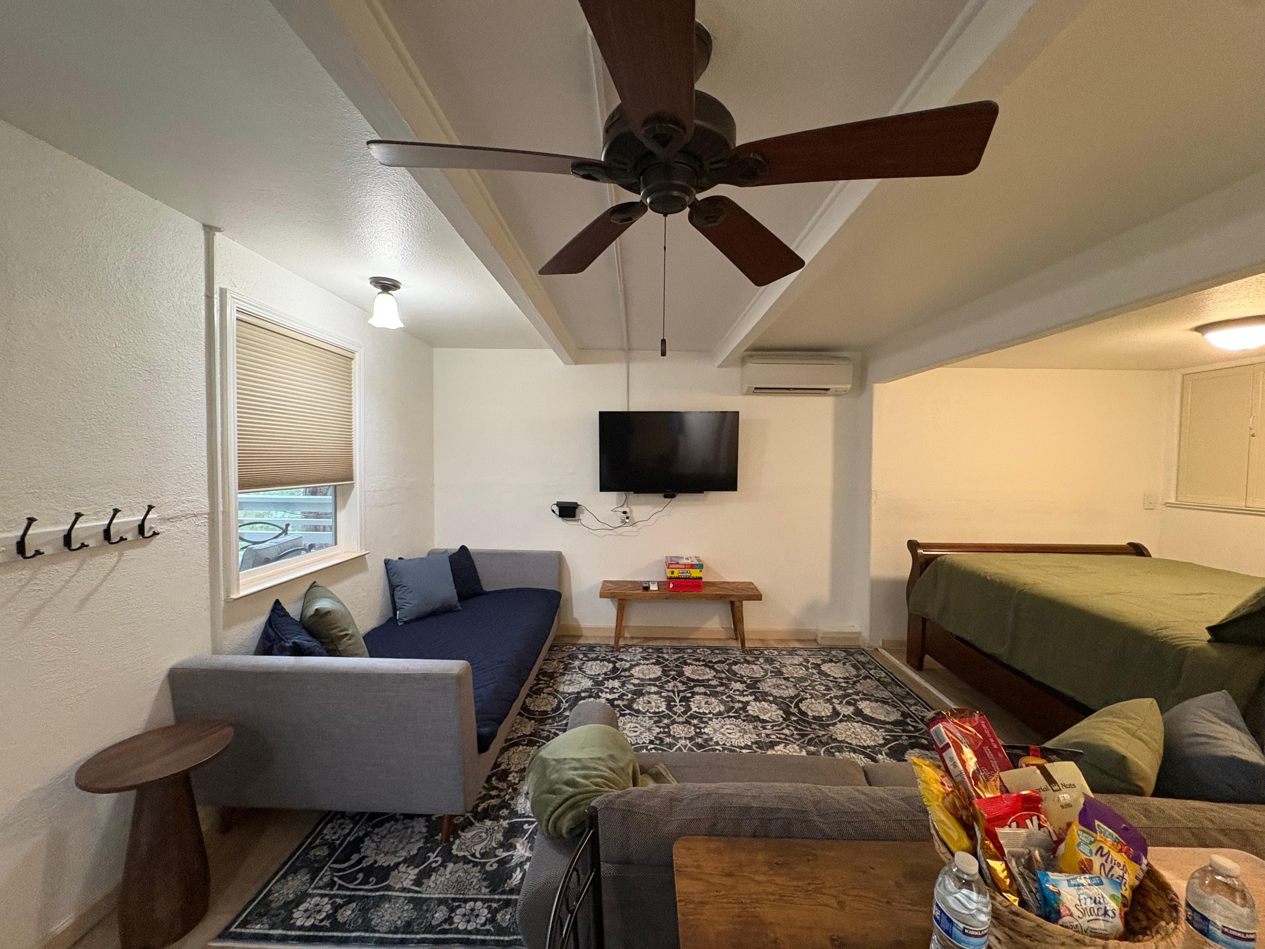 Half Dome Haven living area with ceiling fan and natural light