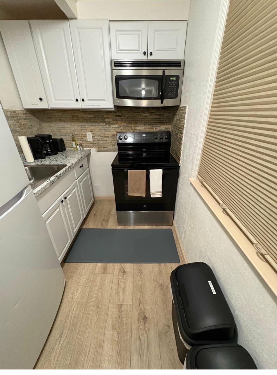 Half Dome Haven bedroom area — queen bed studio cabin